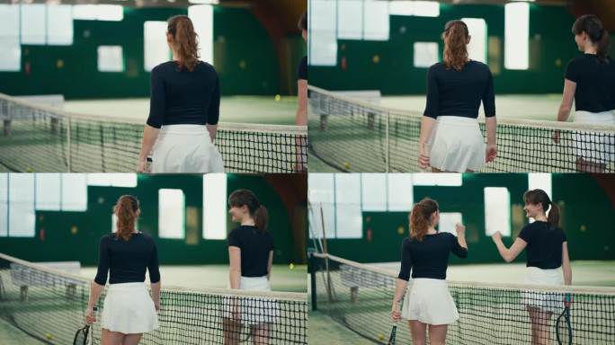 体育俱乐部中快乐的女网球选手在赛后击掌并沿网走的后景
