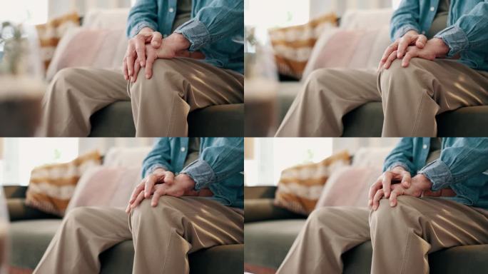 膝盖疼痛，手和老人在沙发上的特写，肌肉，痉挛或炎症在他的家里。Zoom，腿和客厅里患有关节炎、骨质疏