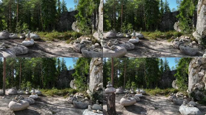 从Lemminkäinen神庙入口处的平衡卵石金字塔看过去。Gumbostrand,芬兰。