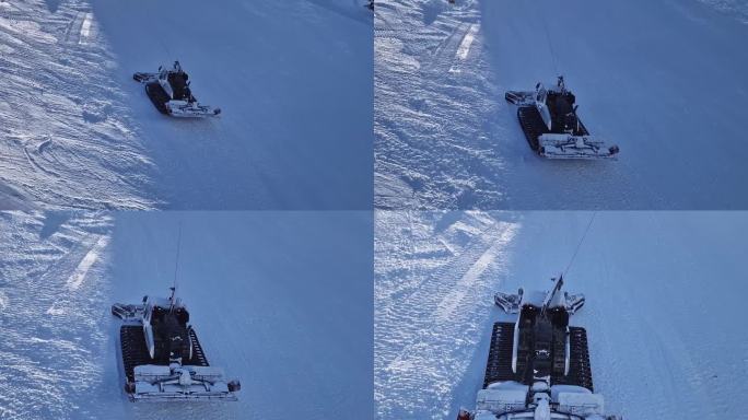 在保加利亚的班斯科滑雪胜地，一辆铲雪车正在铲平山坡上的积雪。山上的雪整理机