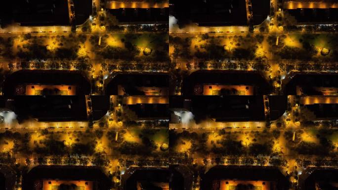 夜间照明飞行在巴塞罗那城市交通街道道路空中俯视全景4k西班牙
