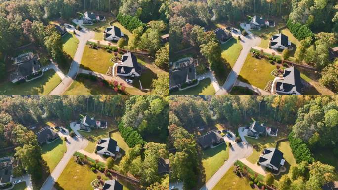 秋天南卡罗来纳郊区黄树之间的新家庭住宅鸟瞰图。美国郊区的房地产开发