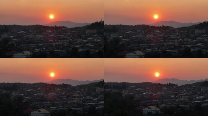 乡村日落，黄昏时候的农村，落日霞光满天