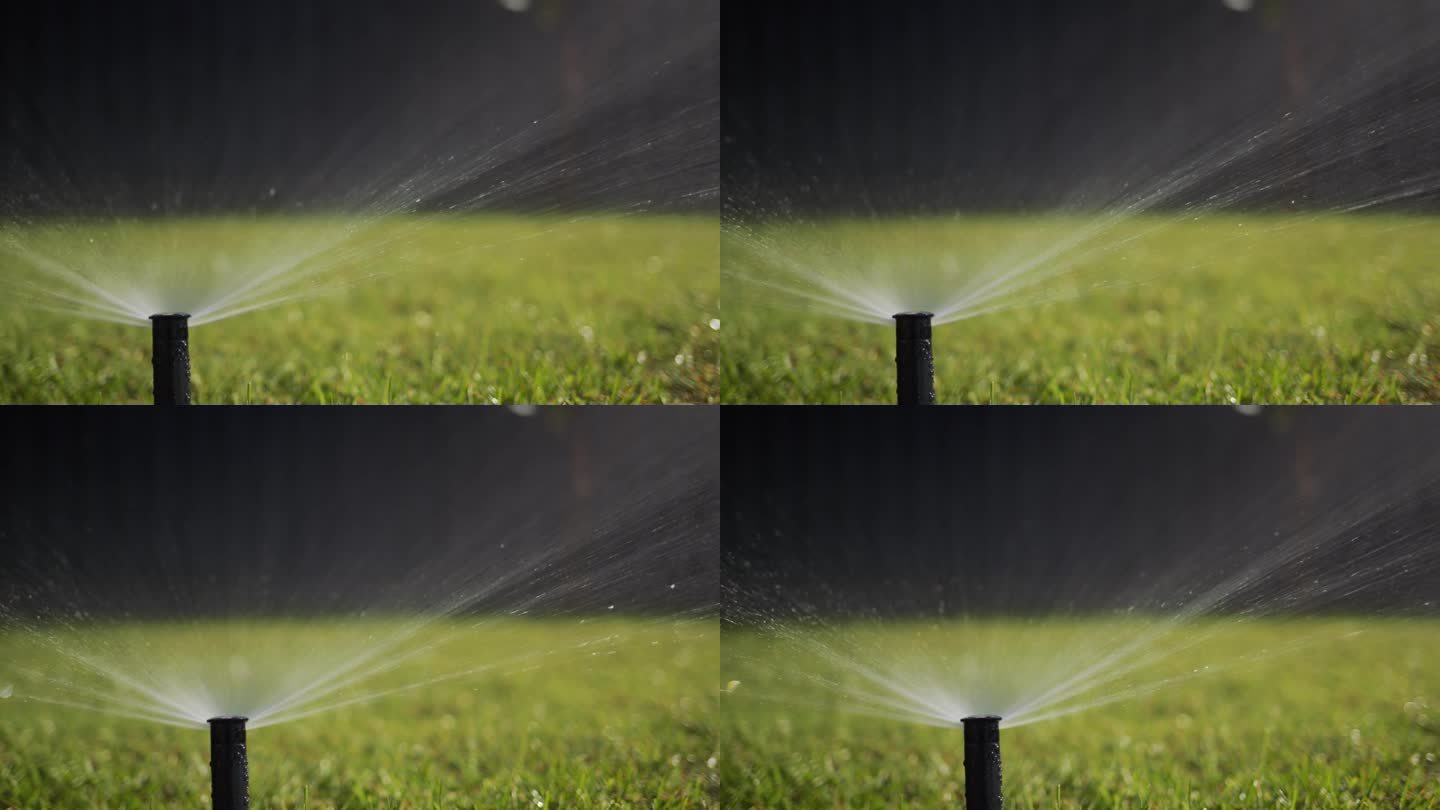 滑杆击球:一股水流在压力下灌溉果岭。