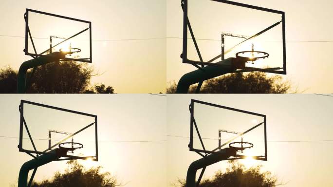 夕阳下的篮球架球篮