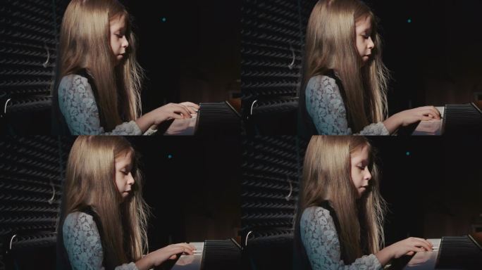 迷人的女孩操作数字钢琴