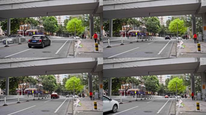 实拍广州越秀南东濠涌高架桥下的车辆行人。