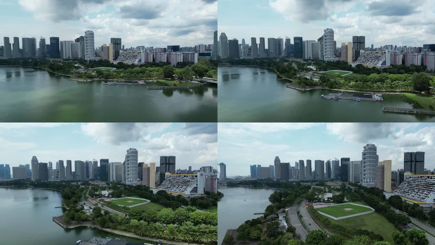无人机拍摄的滨海湾共和国大道，尼科尔公路和甘榜格南地区。镜头缓慢地向城市推进，同时向新加坡摩天观景轮