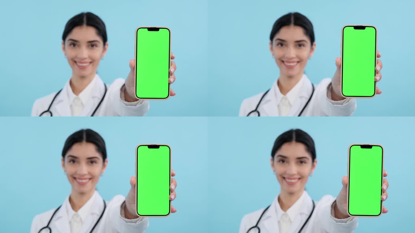 女医生拿着蓝屏绿屏的手机