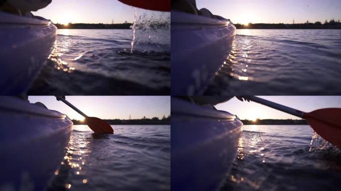 在平静的水面上划桨，在夕阳的背景下，在皮划艇上进行户外活动，水上运动