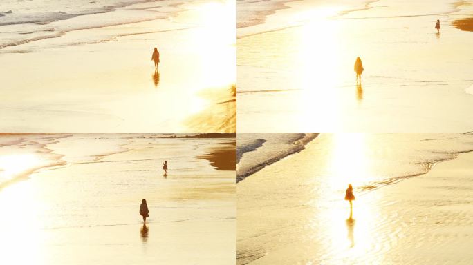 夕阳剪影 女人在海滩孤独走着