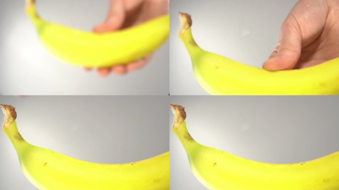 黄香蕉躺在透明的表面上，从底部看。