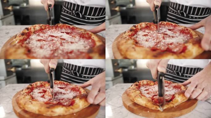 食物，烹饪，意大利菜，人和烹饪概念-厨师手添加磨碎的奶酪比萨在比萨店