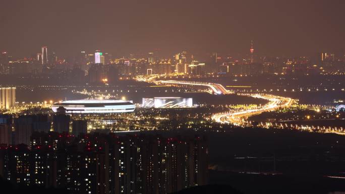 成都龙泉山东安湖体育公园延时俯瞰成都夜景