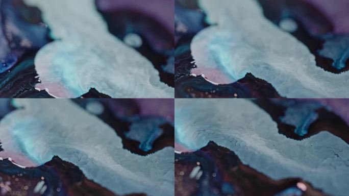 蓝色和白色墨水在水中扩散的抽象漩涡，创造了一种以流体动力学为重点的空灵的颜色混合物
