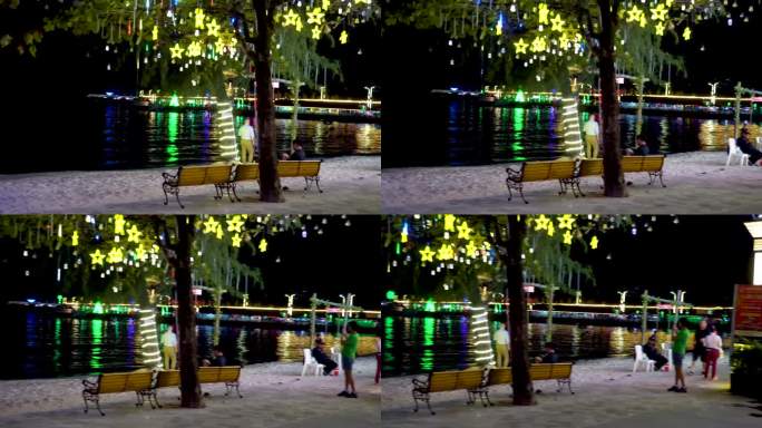 柬埔寨西哈努克城的街道。海滩和海滩咖啡馆。夜城的景色，灯光和灯饰的海洋