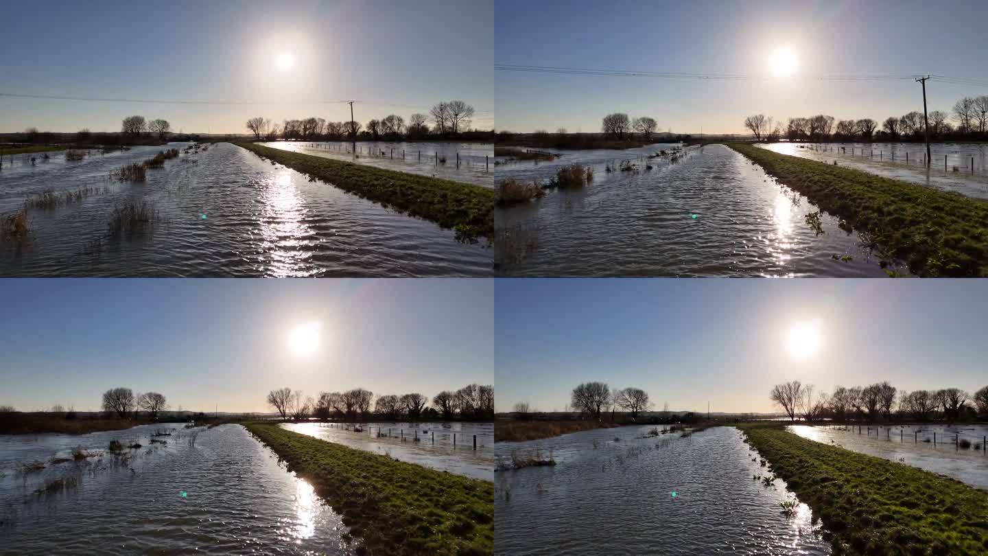 春季，无人机捕捉到一片阳光普照、被水淹没的田野。