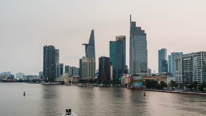 越南胡志明市西贡河建筑群日转夜延时
