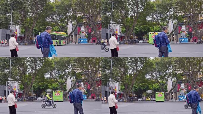 4K实拍广州老城区路口过街的市民与公交车