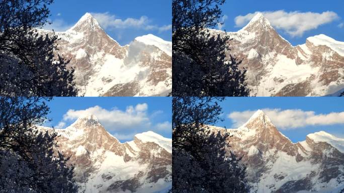 西藏林芝索松村桃花日照金山