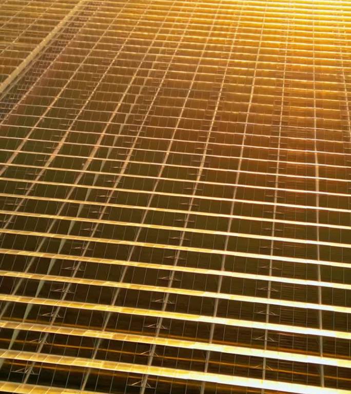 黄金时段农用玻璃温室反射阳光的无人机拍摄