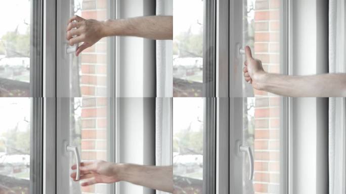 一个男人的手转动窗框的把手，打开了塑料窗。