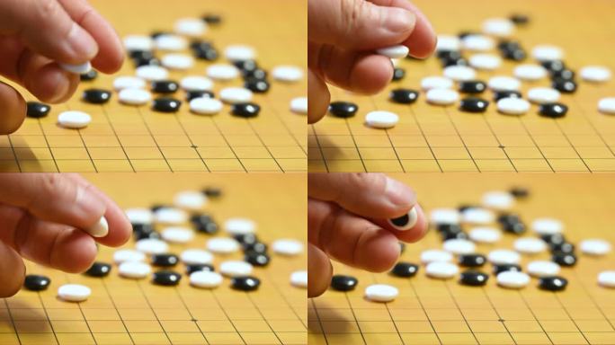 棋盘两人游戏下围棋对弈特写