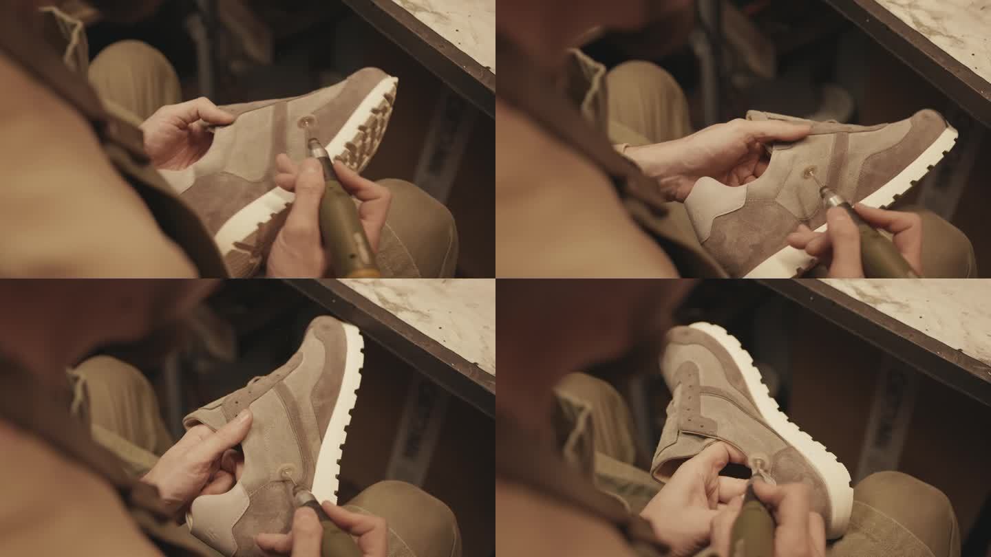 鞋匠的手清洗麂皮运动鞋