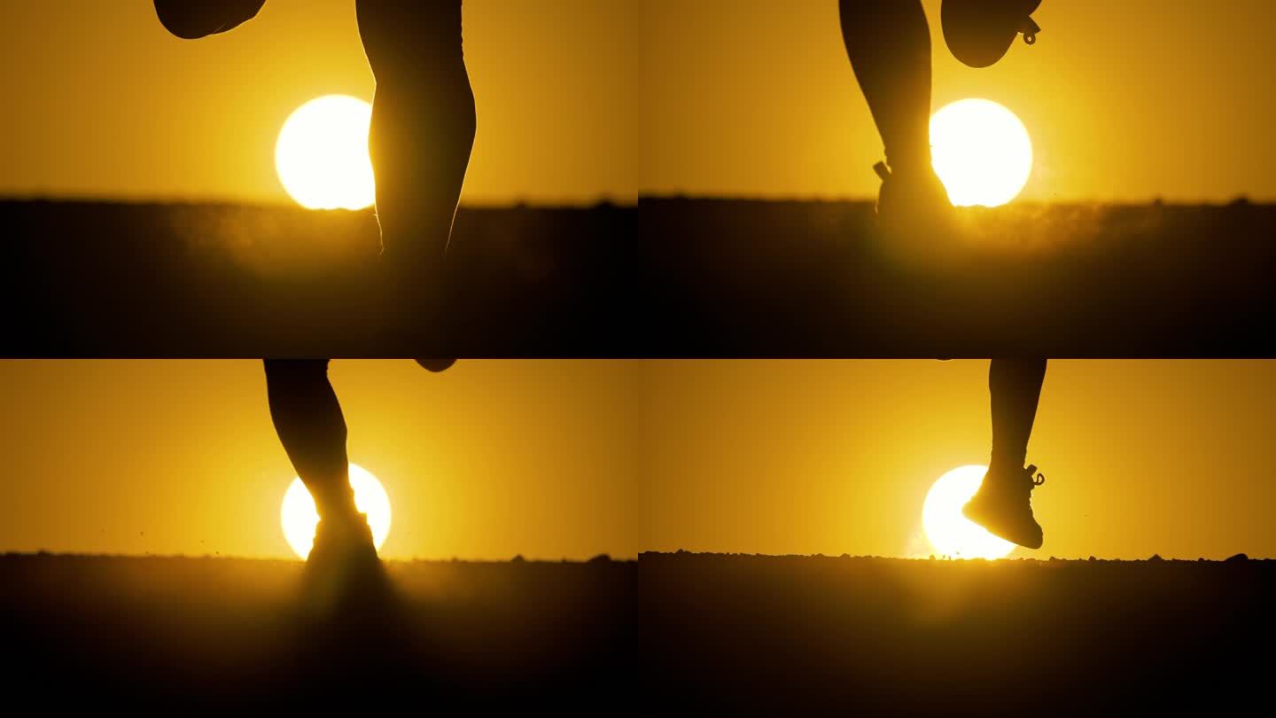 跑步特写日落时分运动员奔跑脚步特写剪影光
