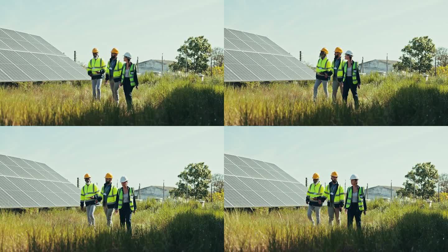 团队、工程师与人配合太阳能电池板，户外与大自然配合，行走与合作。员工，经理和员工与可持续安装，可再生
