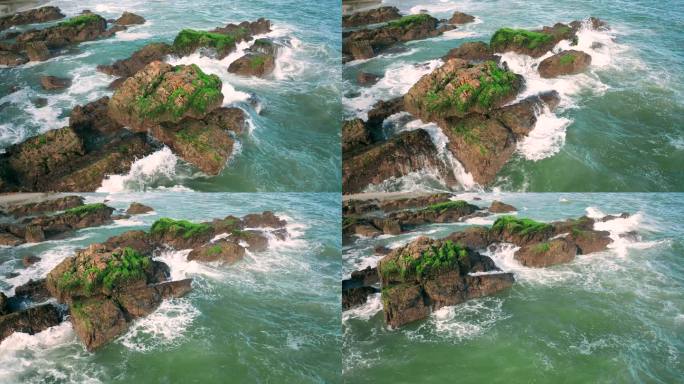 4K航拍大海汹涌海浪拍打礁石飞溅的浪花