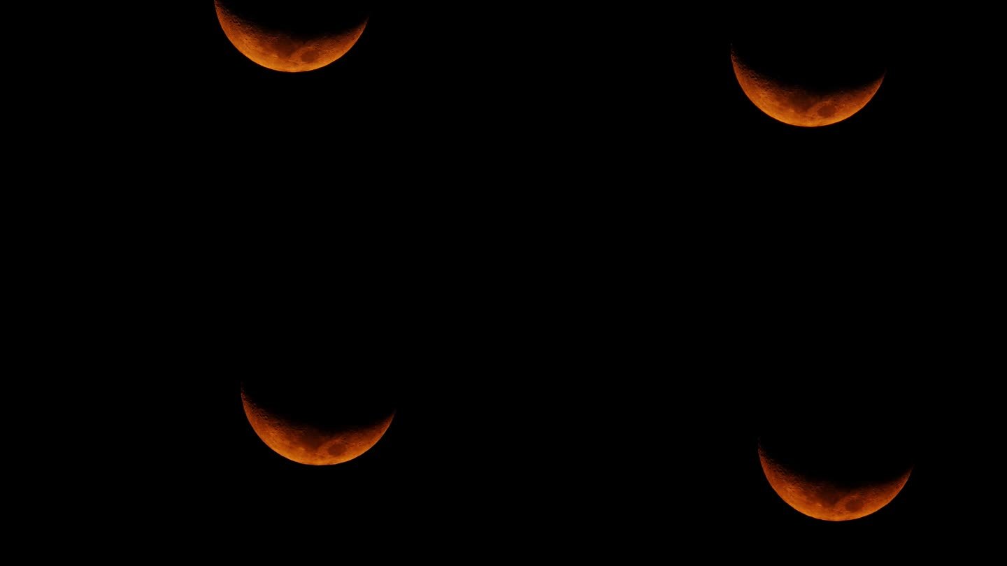 半圆的红月在黑暗中急速落下。