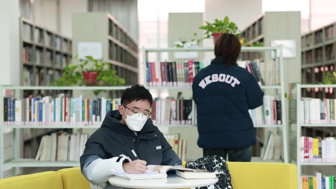 大学校园生活大学生图书馆自习学习看书