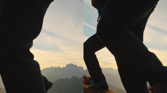 一起攀登:一对夫妇在日落时分征服高山