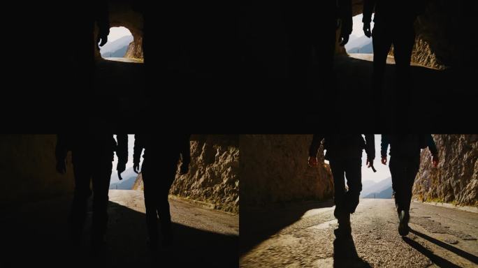 SLO MO出现在光中:冒险的夫妇走出山间隧道