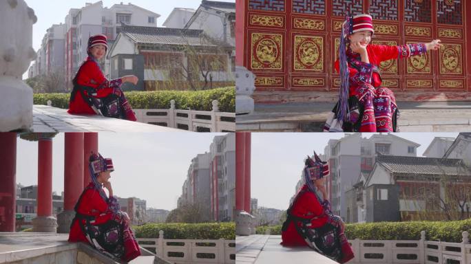 坐在中国风建筑台阶上微笑的石林阿诗玛美女