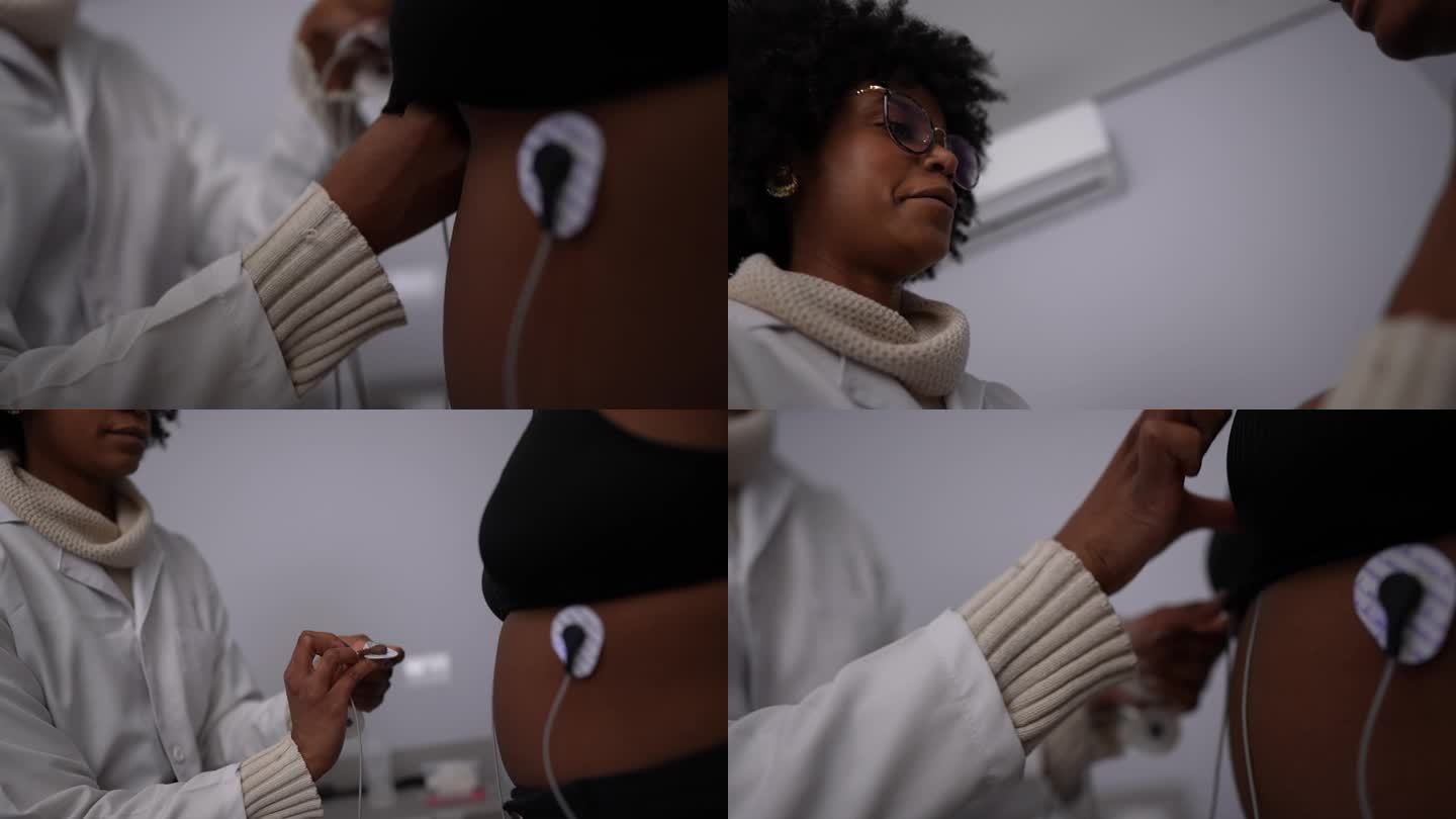 女医生在医生办公室给病人戴上电极