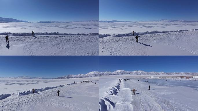 女孩在新疆赛里木湖白雪覆盖的湖面上行走