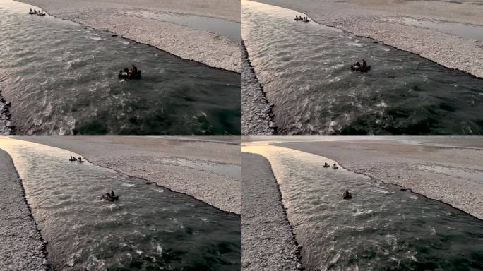 巴基斯坦斯瓦特山谷，渔民们驾着一艘由汽车轮胎制成的充气船在河上航行