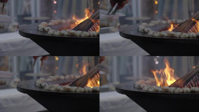 在露天壁炉上烹饪生食的慢动作镜头