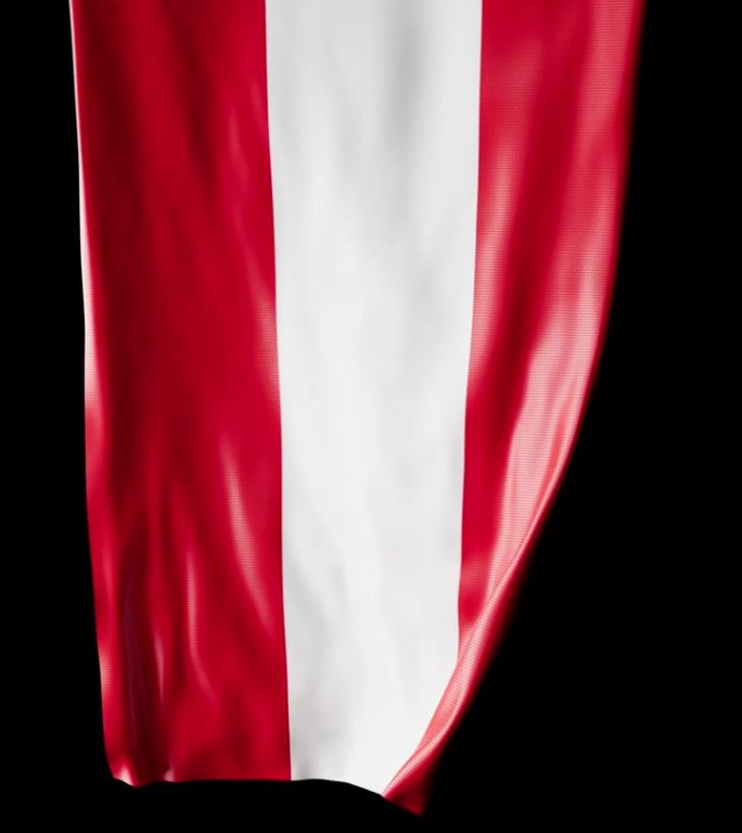 奥地利国旗卷成圆柱形，在旋转时展开并起伏