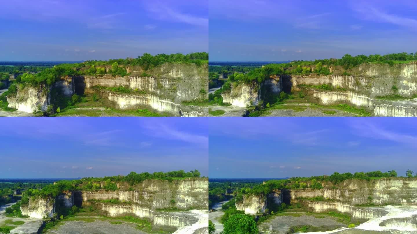 在Bukit jaddh或jaddh山上翱翔，这是印度尼西亚马杜拉的一个引人注目的白色石灰岩悬崖。