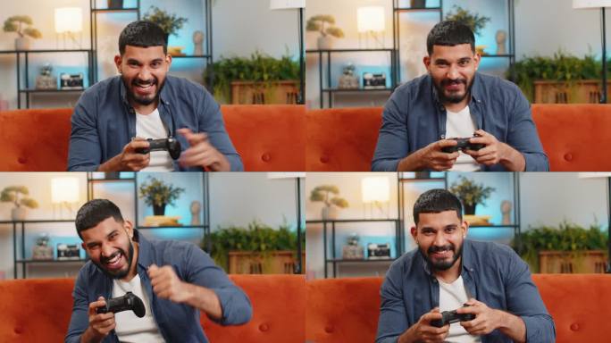 一名印度男子坐在家里的沙发上，用摇杆控制器玩视频游戏机，赢得了在线游戏的胜利