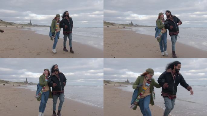 海边的乐趣情侣在海边玩耍