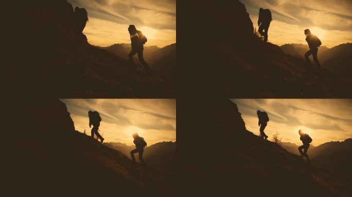 SLO MO剪影攀登:夫妇在黄金时间的雄伟攀登