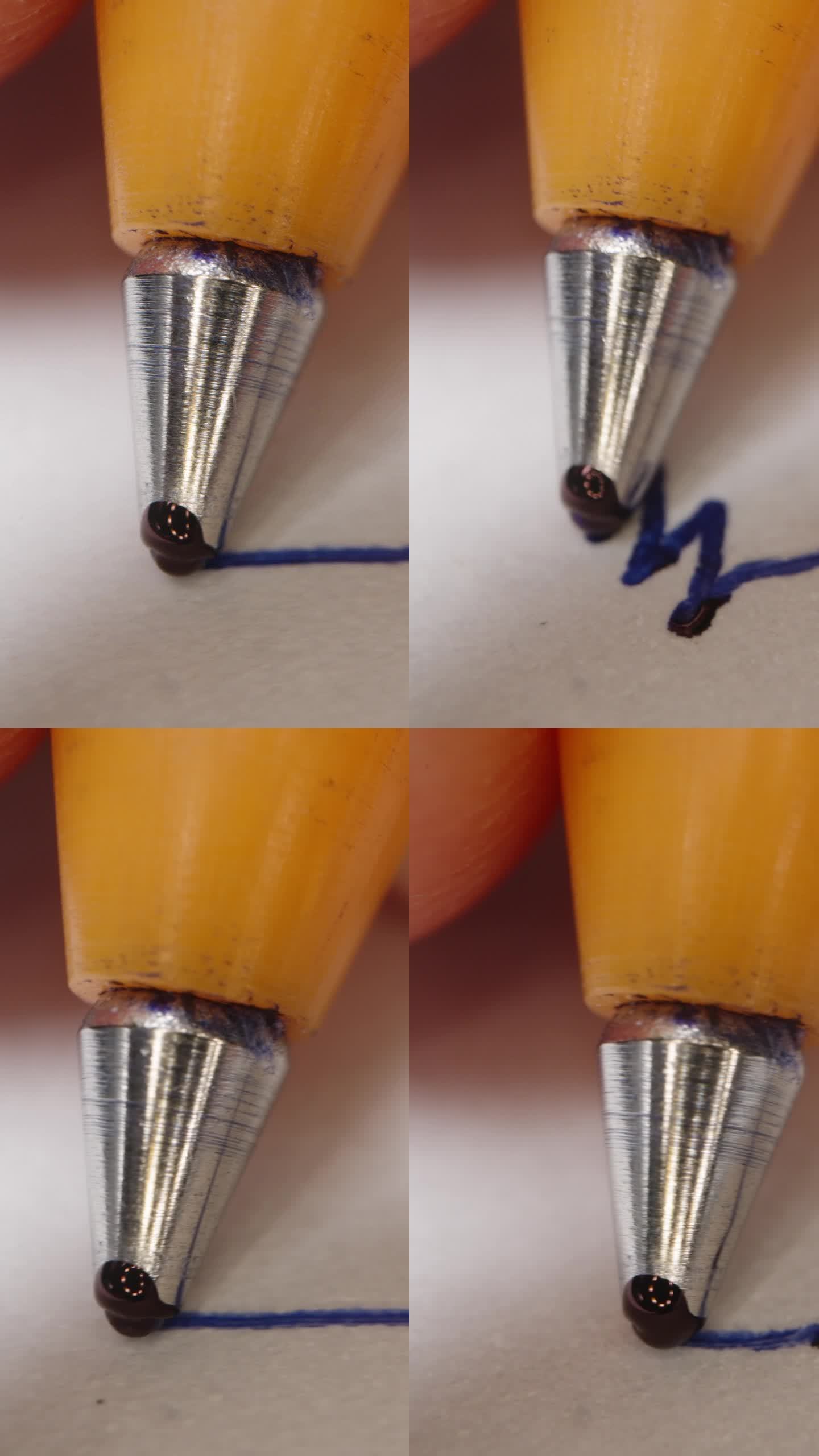 垂直视频。手里拿着圆珠笔，微距拍摄，墨水在圆珠笔的末端流淌。它在写东西。