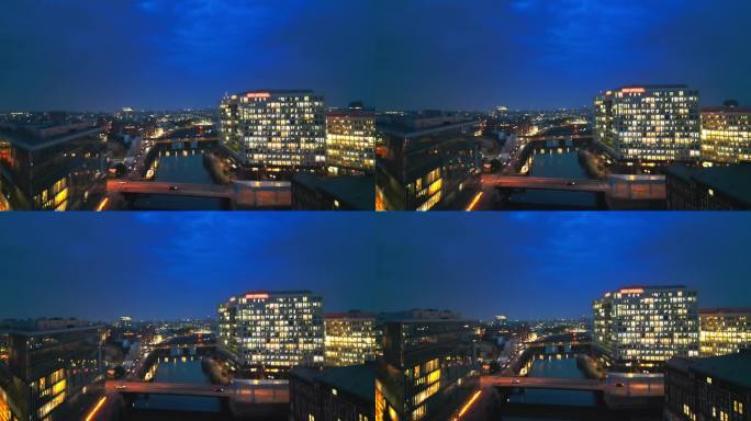 4K鸟瞰图实时拍摄的汉堡城市夜景，德国，旅游和旅游目的地是德国北部的一个主要港口城市，欧洲