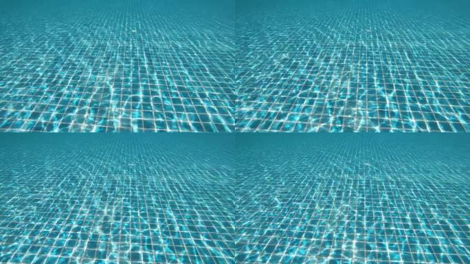 潜入水中的蓝色游泳池，美丽的泳池纹理背景