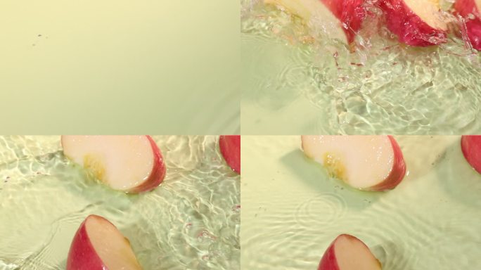 被切开的苹果在水面发生碰撞激起水花升格