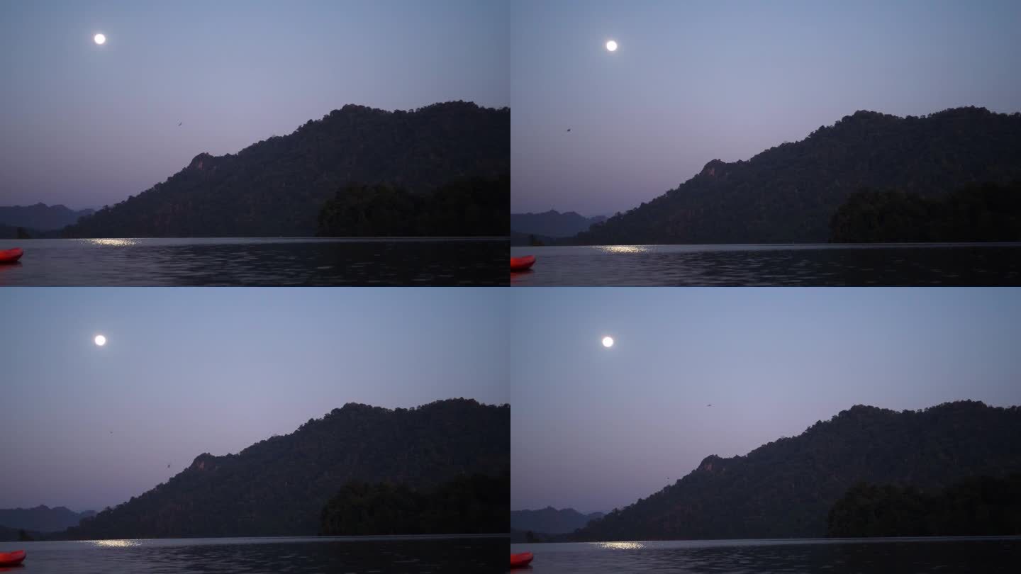 月升在宁静的湖面上